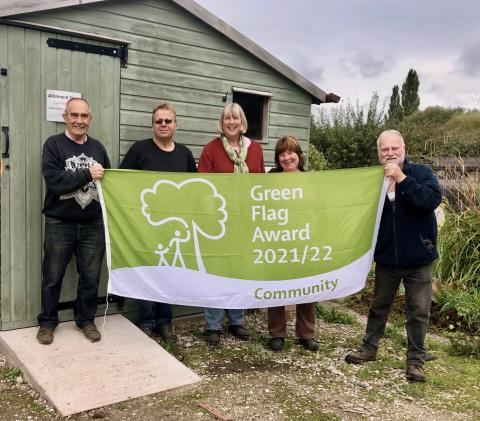 Green Flag with volunteers